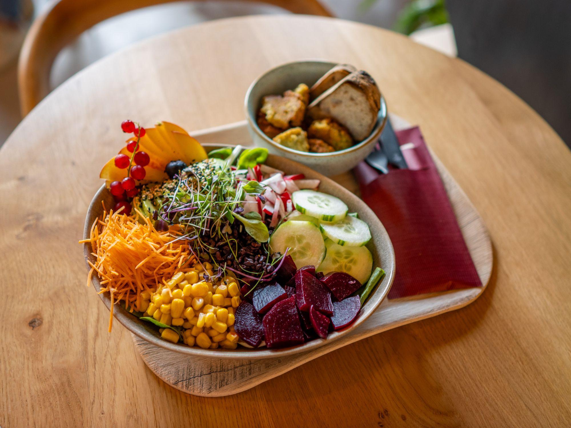 Colourful healthy lunch bowl made with fresh vegetables, grains, and wholesome ingredients